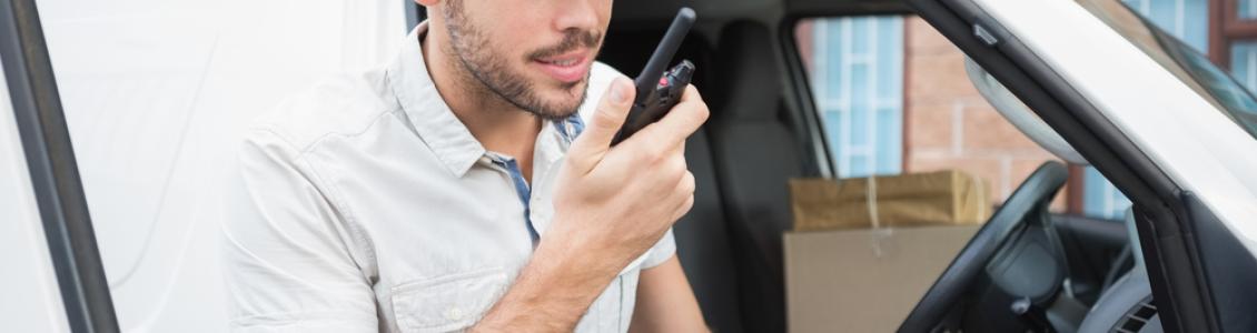 van driver working hard, reporting in to his office